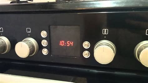 how do i set the clock on my kenwood cooker